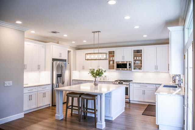 big and spacious kitchen with white counters