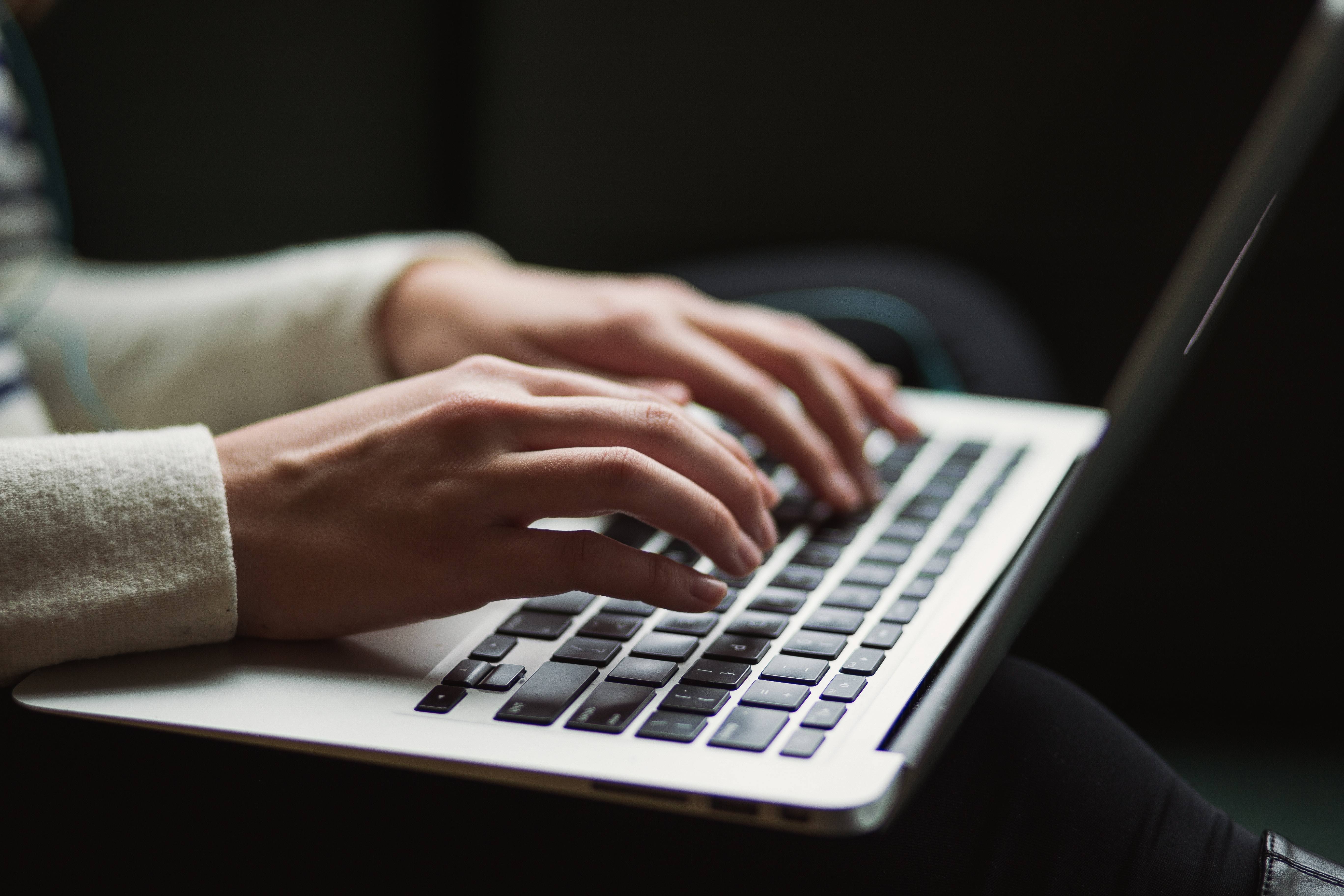 someone typing on a computer